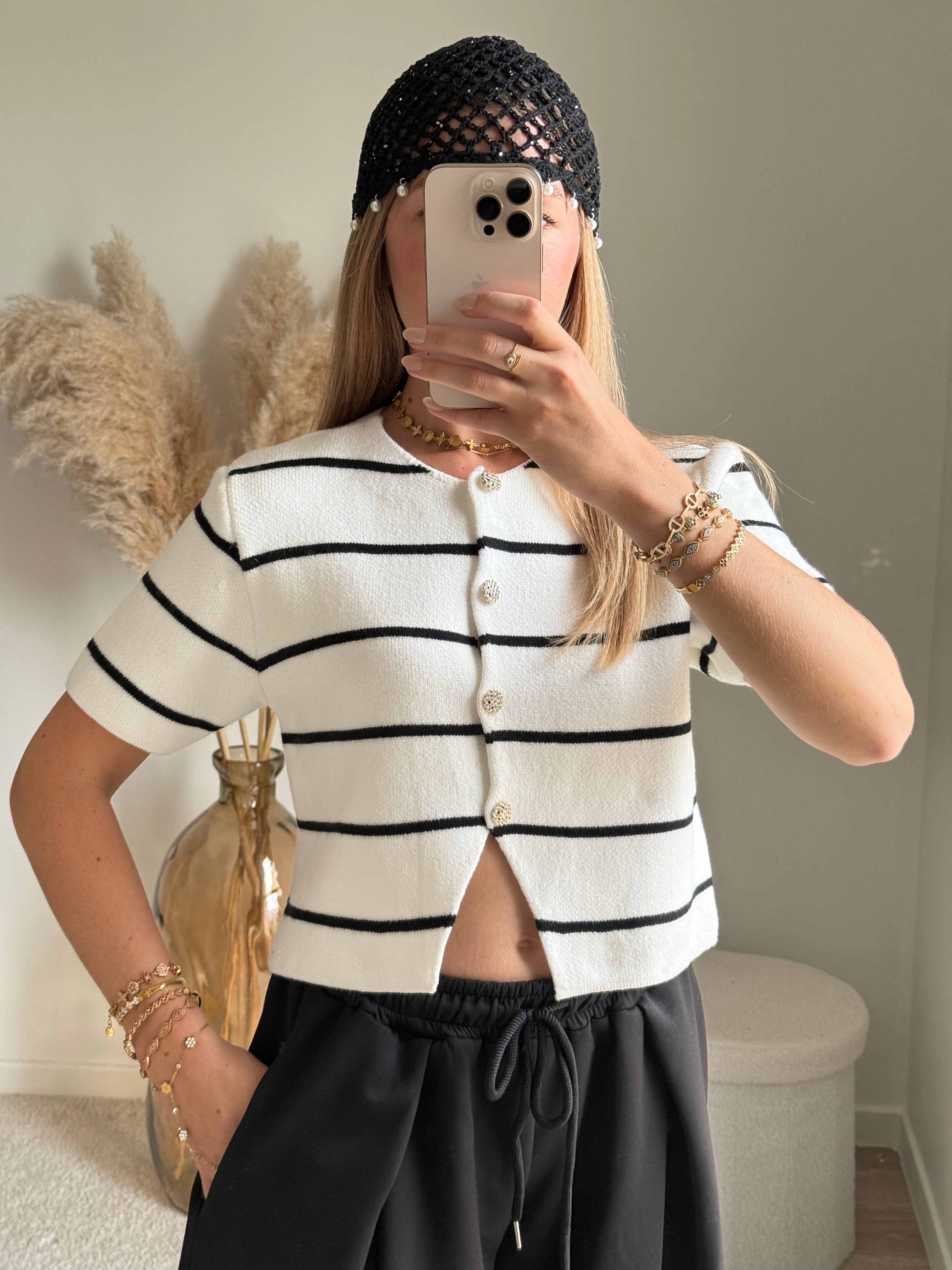 Gilet en maille avec fermeture bouton en strass