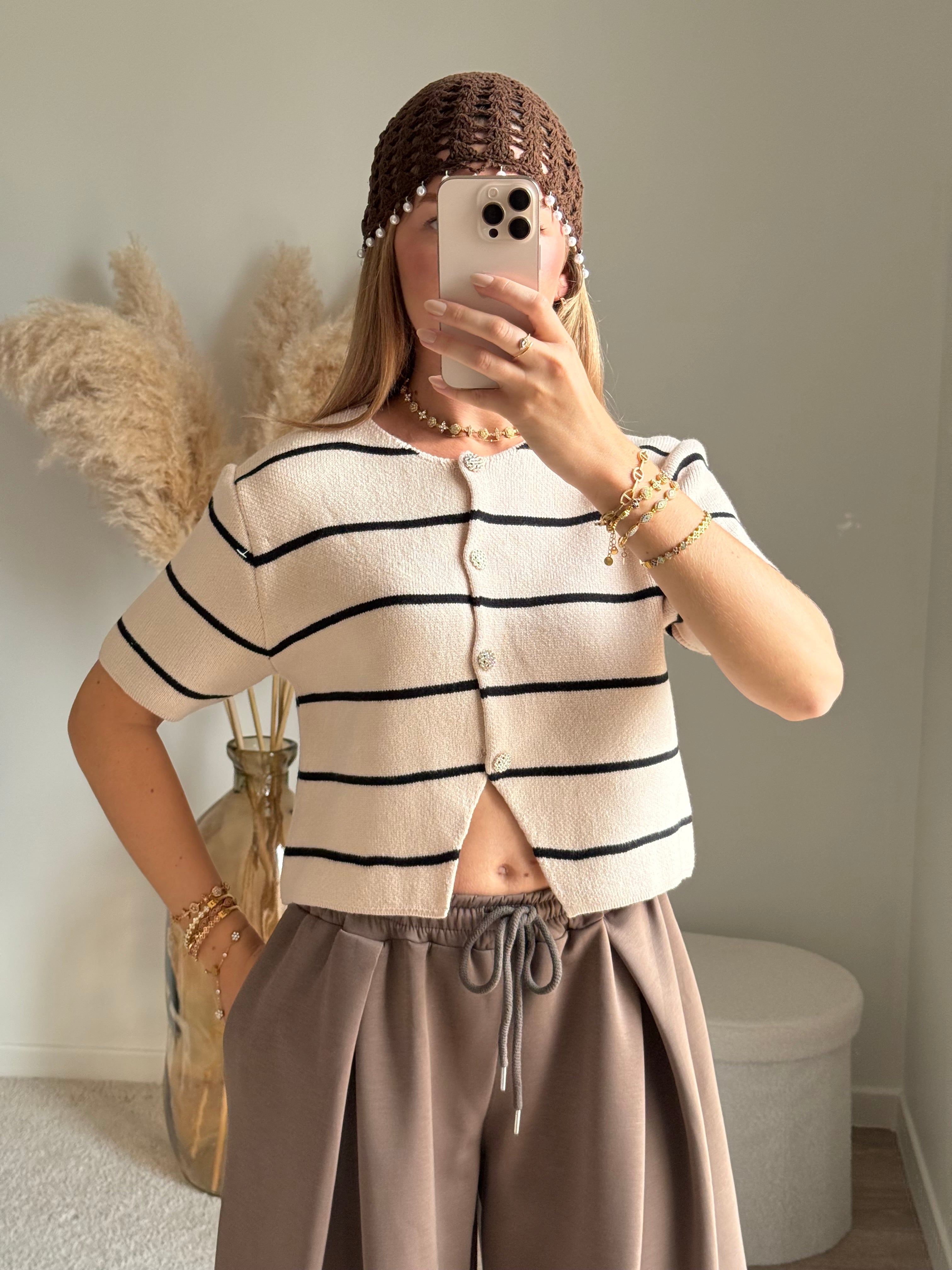 Gilet en maille avec fermeture bouton en strass
