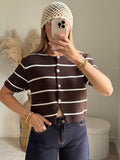 Gilet en maille avec fermeture bouton en strass