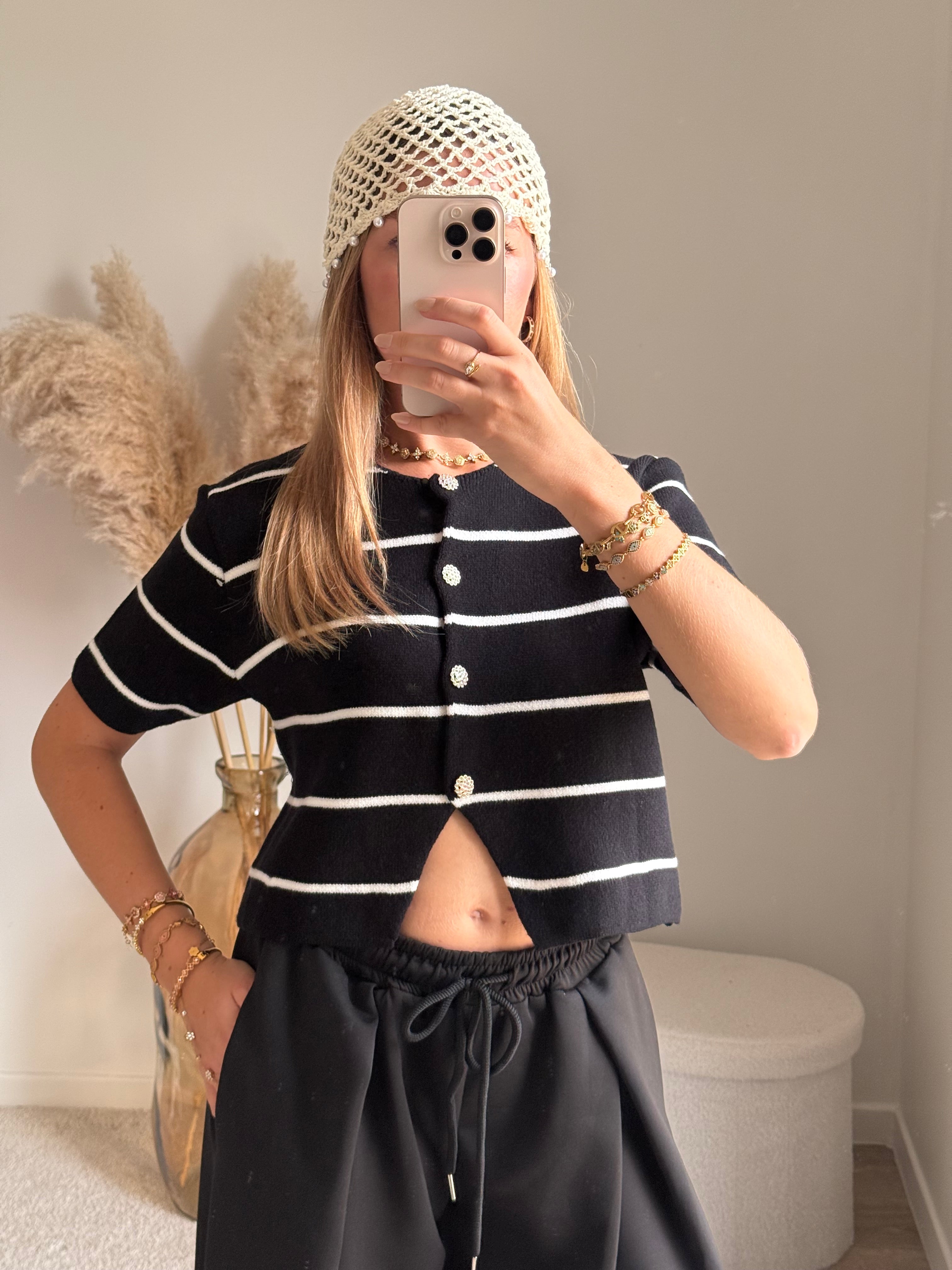 Gilet en maille avec fermeture bouton en strass