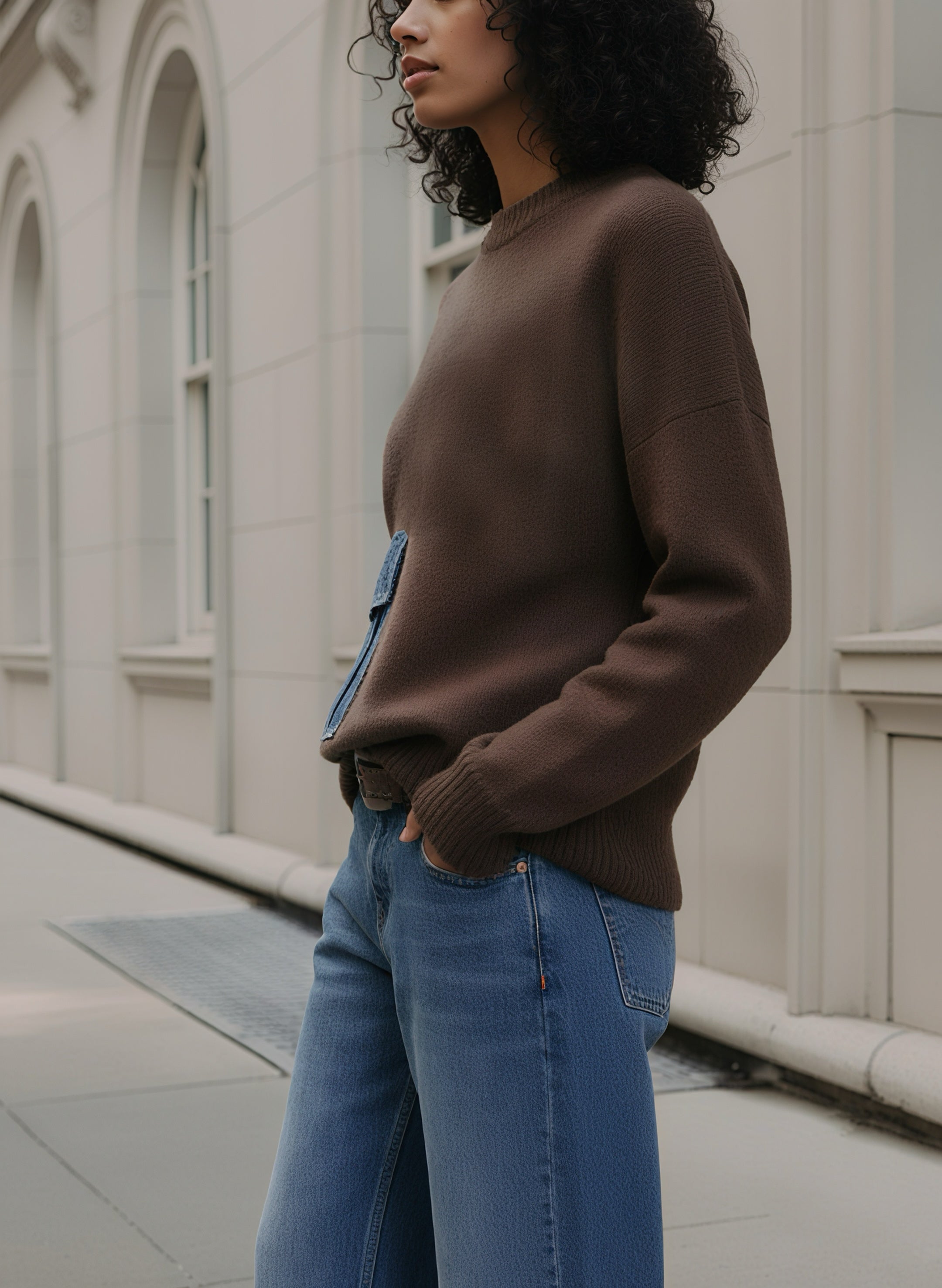 Pull en maille à poche en jean