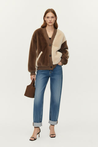 veste-cardigan en fausse fourrure bicolore.