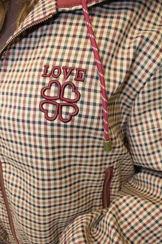 Blouson coupe-vent à motif carreaux bordeaux