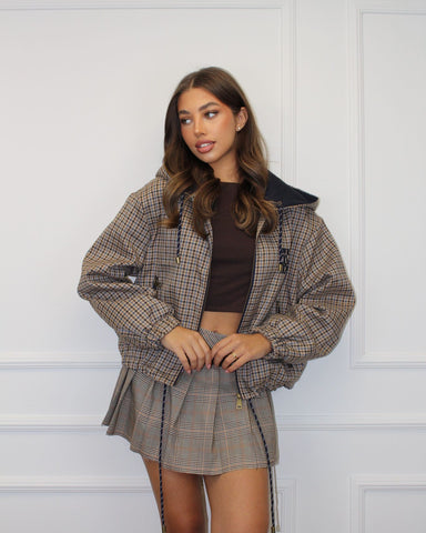 Blouson coupe-vent à motif carreaux bleu