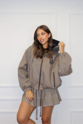 Blouson coupe-vent à motif carreaux bleu