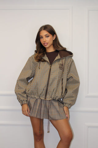 Blouson coupe-vent à motif carreaux marron
