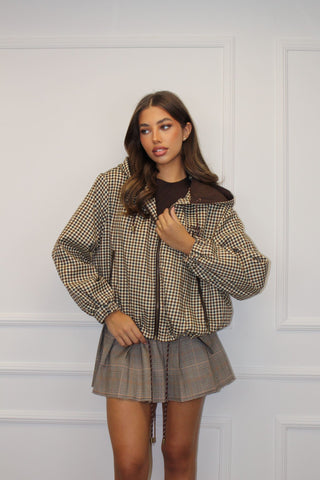 Blouson coupe-vent à motif carreaux marron