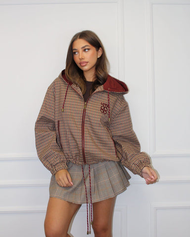 Blouson coupe-vent à motif carreaux bordeaux