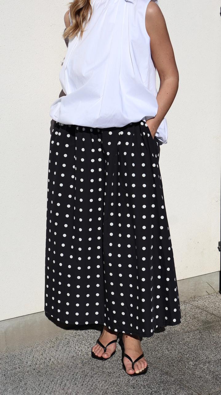JUPE MIDI À POIS VOLUMINEUSE