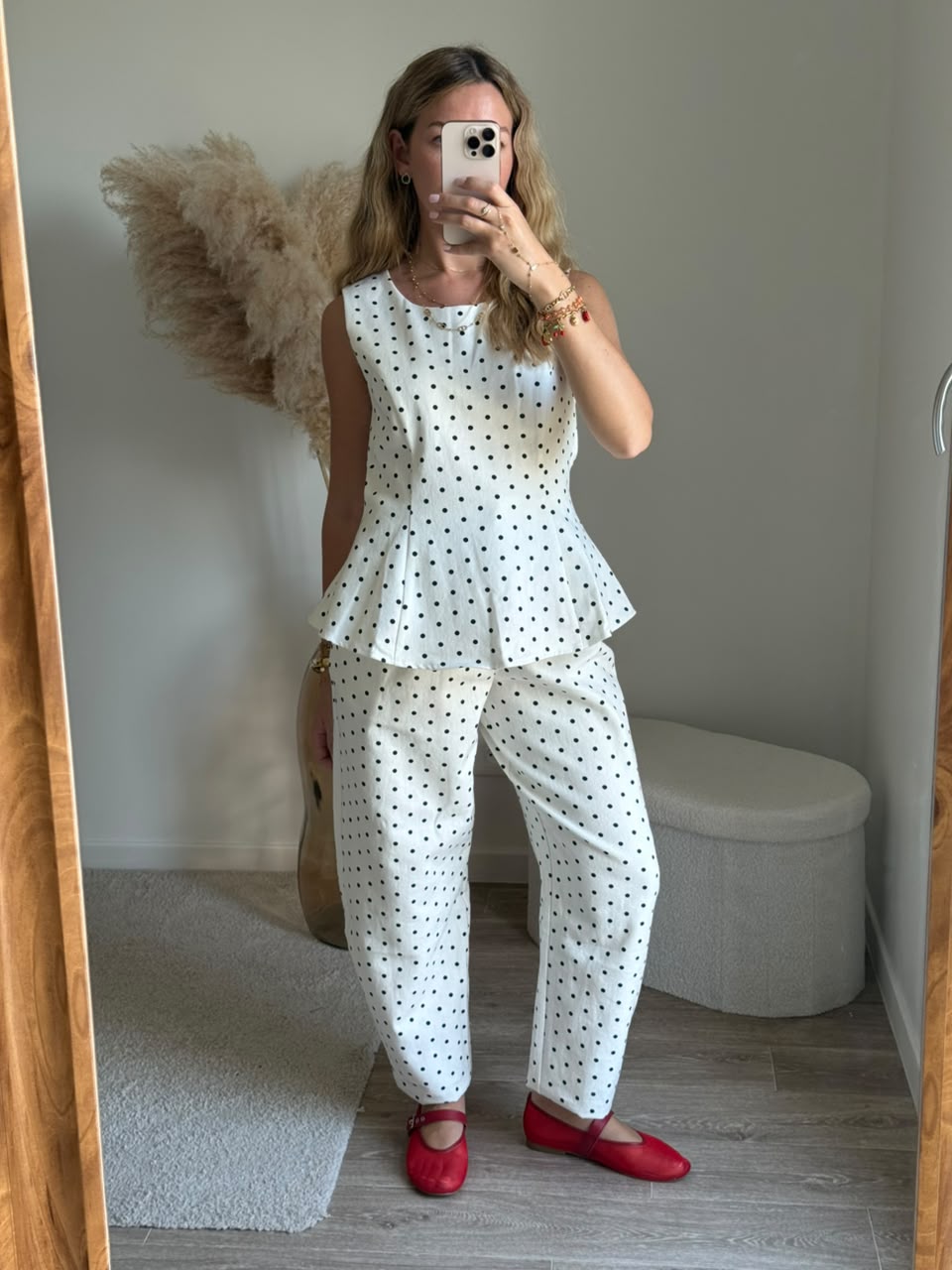 Top sans manches à imprimé pois et coupe péplum - Blanc