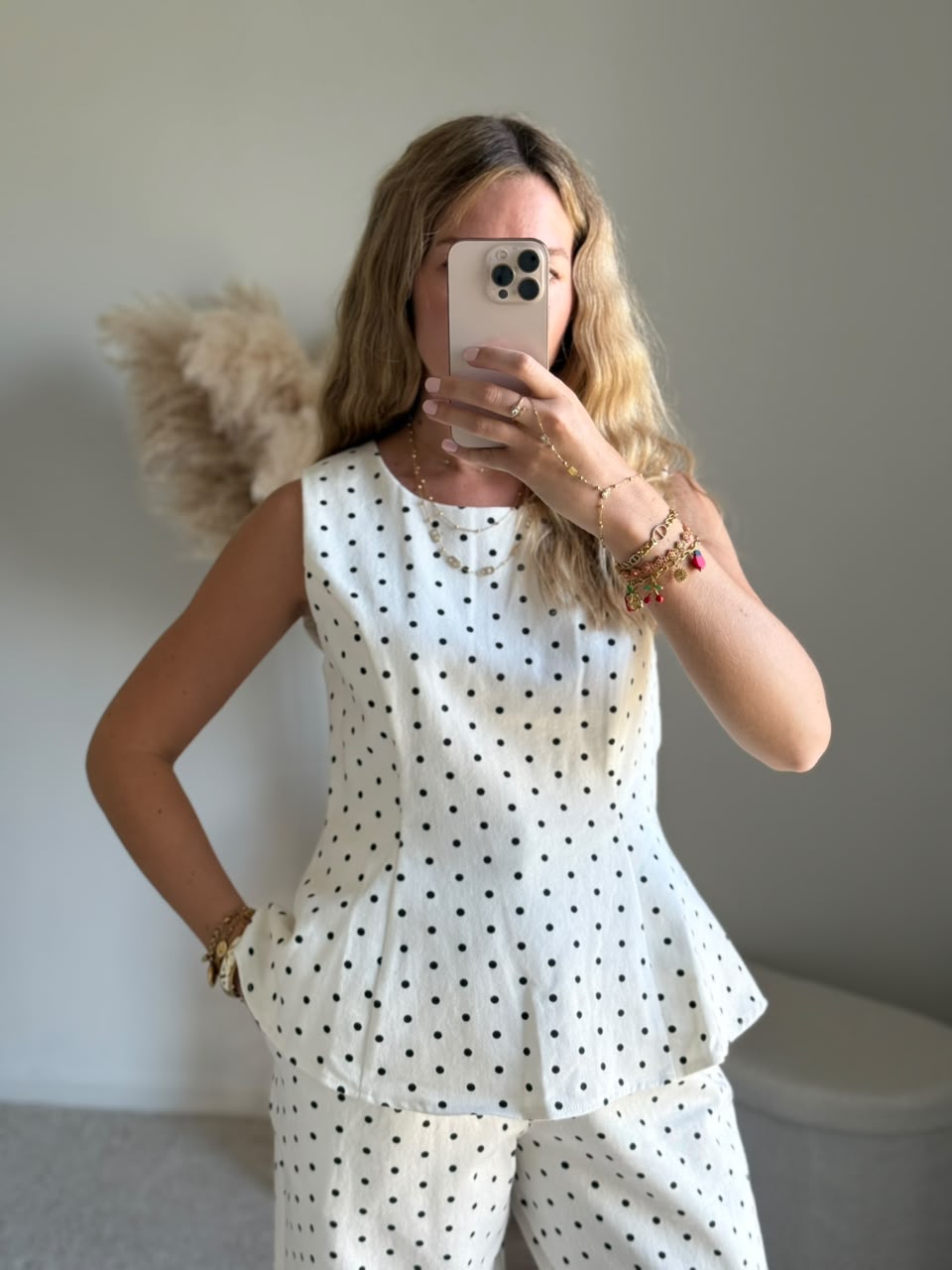 Top sans manches à imprimé pois et coupe péplum - Blanc