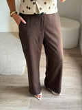 Pantalon large en lin avec broderie anglaise au bas