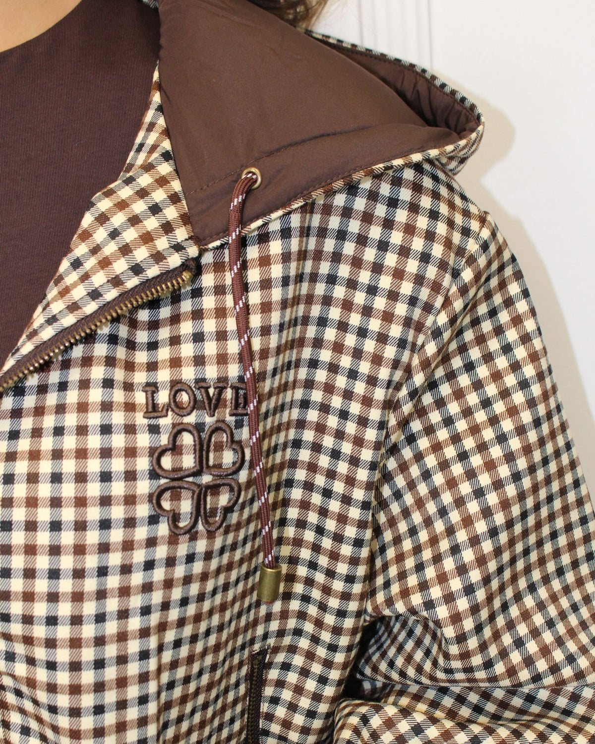 Blouson coupe-vent à motif carreaux marron